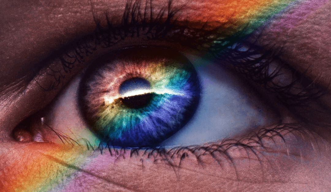 closeup of eye with superimposed rainbow